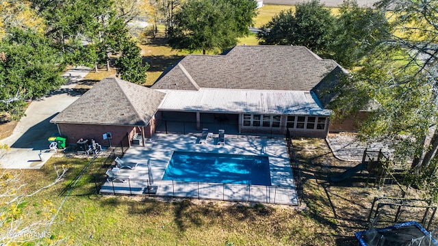 view of pool featuring a fenced in pool, a patio area, and fence