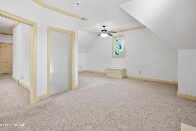 bonus room with ceiling fan, light colored carpet, and lofted ceiling