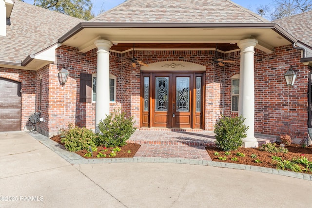 property entrance with a porch and french doors