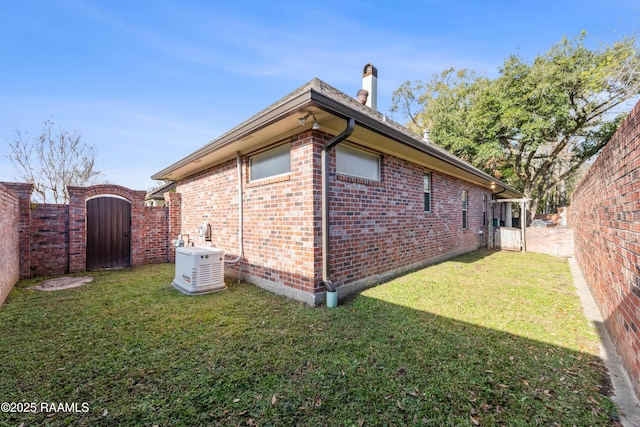 view of property exterior featuring a lawn