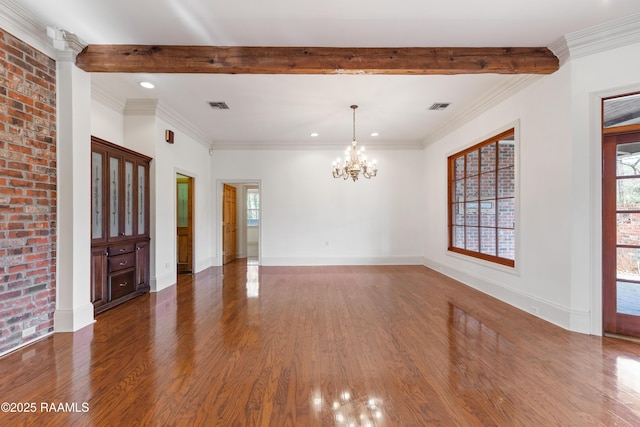 interior space with beamed ceiling, ornamental molding, a chandelier, and dark hardwood / wood-style flooring