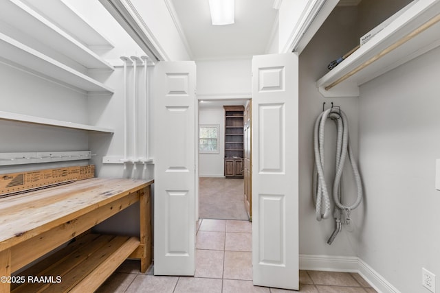 interior space with light tile patterned floors