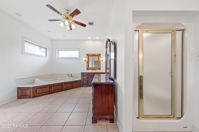 bathroom featuring crown molding, vanity, shower with separate bathtub, and tile patterned flooring