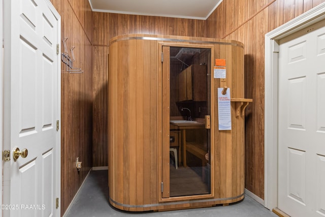 view of sauna with concrete floors