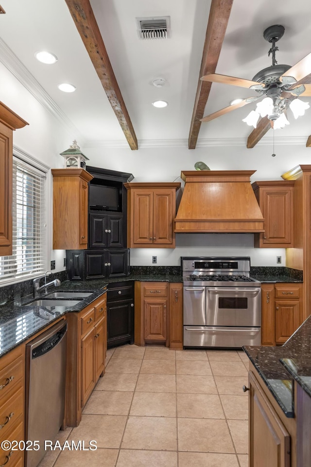 kitchen featuring beamed ceiling, sink, ornamental molding, stainless steel appliances, and custom range hood