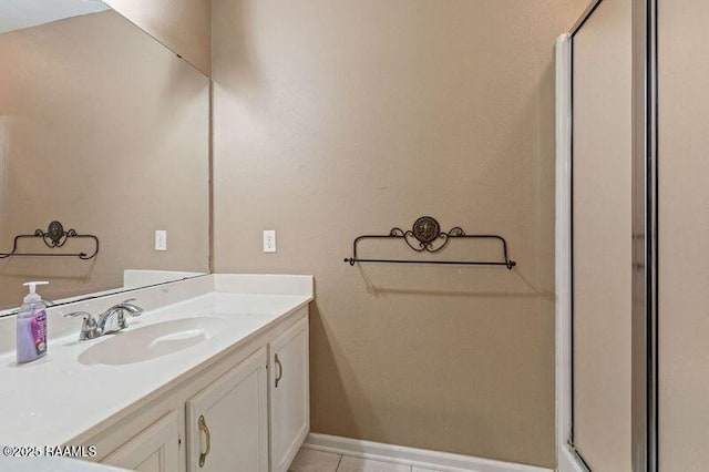 bathroom featuring vanity and tile patterned flooring