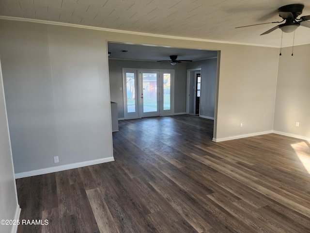 empty room with dark wood-type flooring, ceiling fan, and ornamental molding