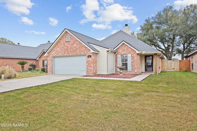 front facade featuring a front yard and a garage