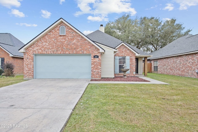 view of property with a front lawn and a garage