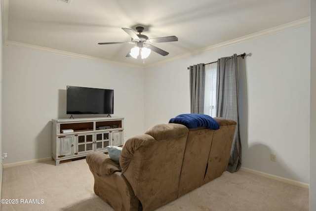 living room with ceiling fan, light colored carpet, and crown molding