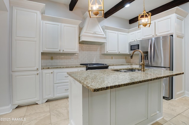 kitchen with light stone countertops, white cabinets, decorative light fixtures, sink, and beam ceiling