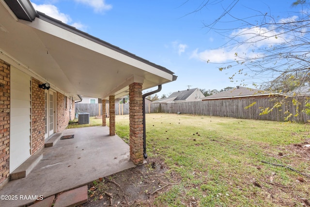 view of yard with a patio and cooling unit