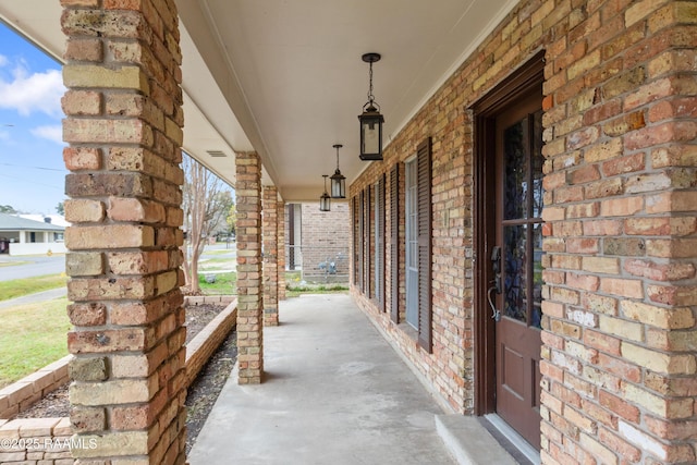 view of patio featuring a porch