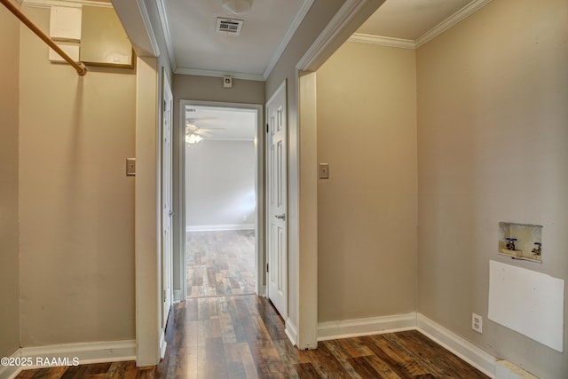 hall with ornamental molding and dark hardwood / wood-style flooring