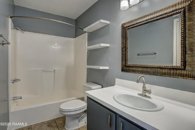 full bathroom with tile patterned flooring, vanity, tub / shower combination, and toilet