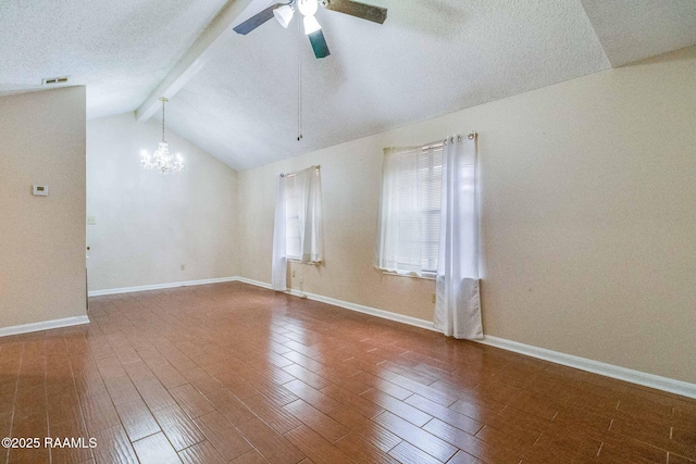 unfurnished room featuring hardwood / wood-style floors, ceiling fan with notable chandelier, vaulted ceiling with beams, and a textured ceiling