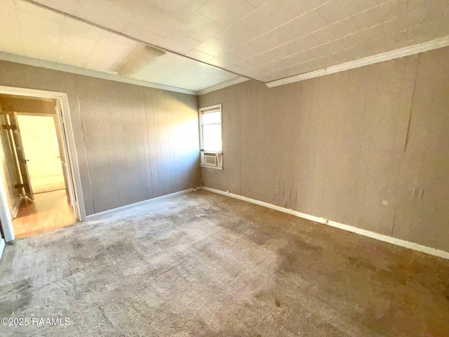 spare room with cooling unit and carpet flooring