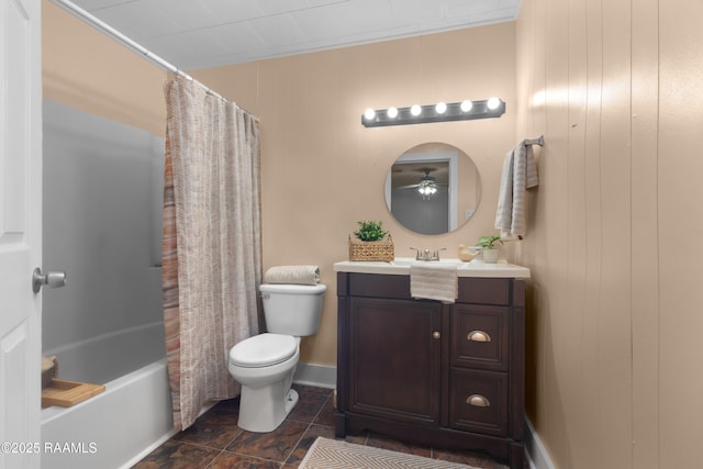 full bathroom with vanity, shower / tub combo, and toilet