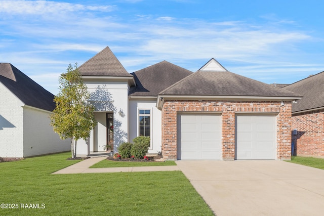 view of front of home with a garage and a front yard