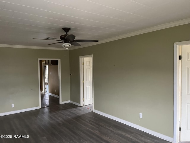 spare room featuring crown molding, dark hardwood / wood-style floors, and ceiling fan