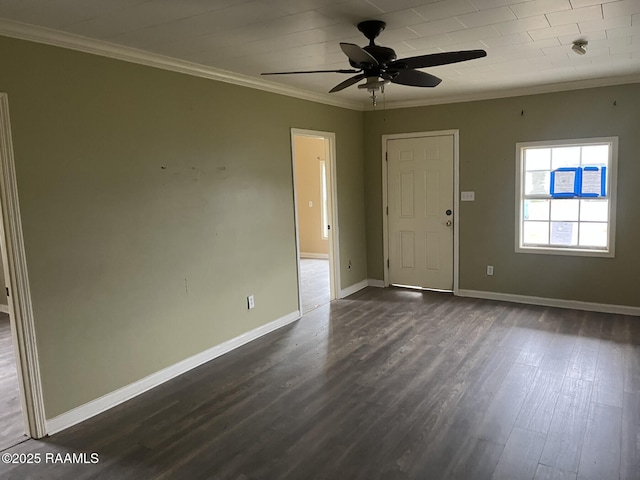 interior space with ornamental molding, dark hardwood / wood-style floors, and ceiling fan