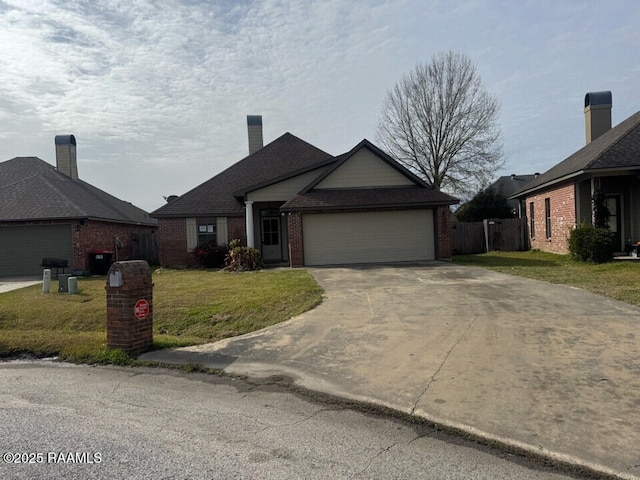 view of front of home with a garage and a front yard