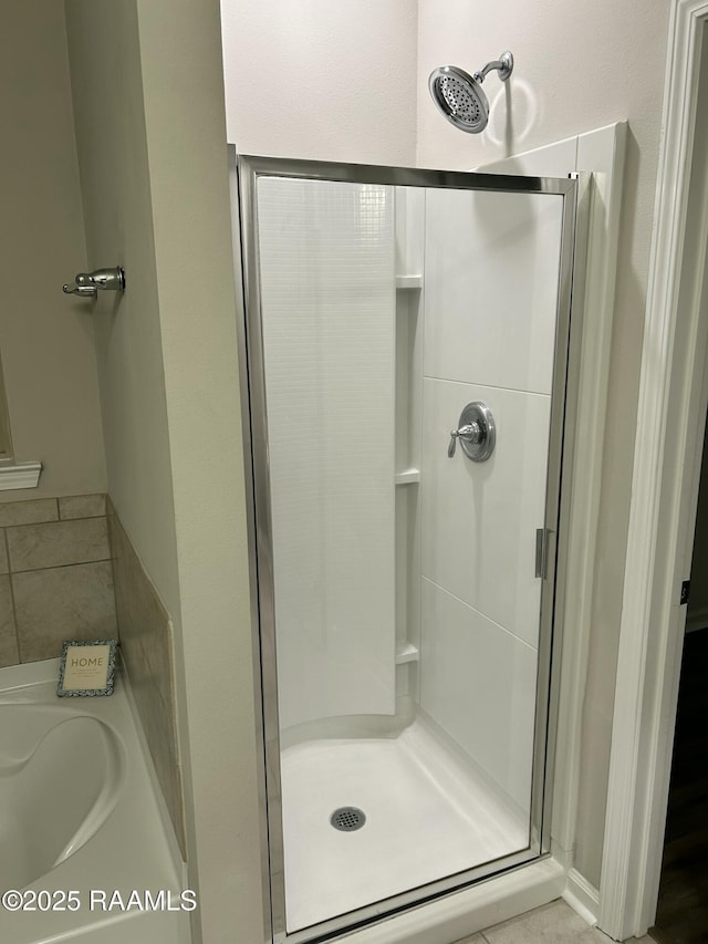 bathroom featuring plus walk in shower