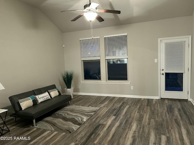 unfurnished living room featuring ceiling fan, lofted ceiling, and dark hardwood / wood-style flooring