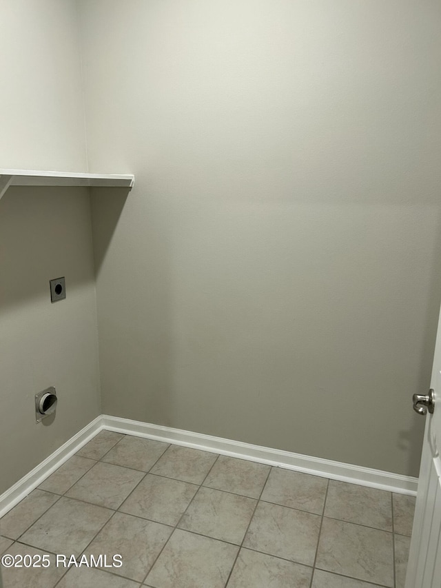 laundry area featuring electric dryer hookup and tile patterned floors