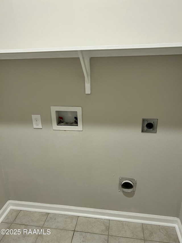 laundry room with tile patterned floors, hookup for an electric dryer, hookup for a gas dryer, and hookup for a washing machine