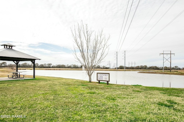 view of yard featuring a water view and a gazebo