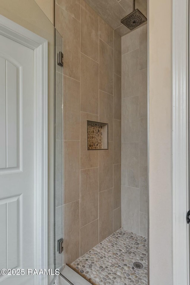 bathroom with an enclosed shower