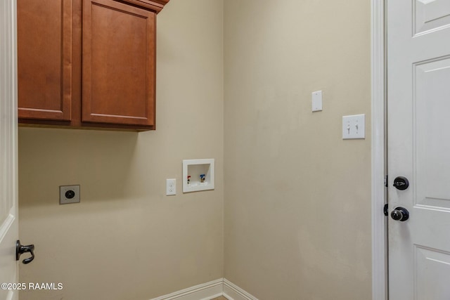 laundry area with washer hookup, cabinets, and hookup for an electric dryer