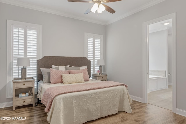 bedroom with hardwood / wood-style floors, ornamental molding, and ceiling fan