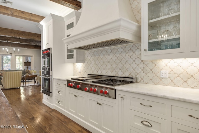 kitchen with custom range hood, decorative backsplash, beam ceiling, dark hardwood / wood-style flooring, and stainless steel appliances