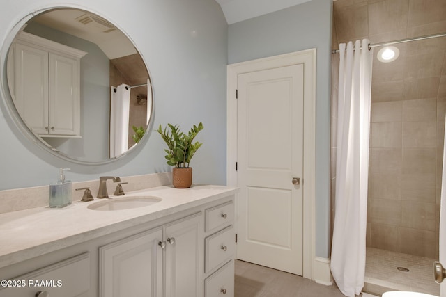 bathroom with vanity and a shower with shower curtain