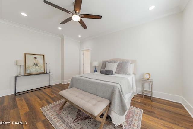 bedroom with dark wood-type flooring, ornamental molding, and ceiling fan