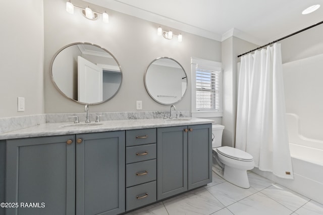 full bathroom with vanity, ornamental molding, toilet, and shower / bath combo with shower curtain