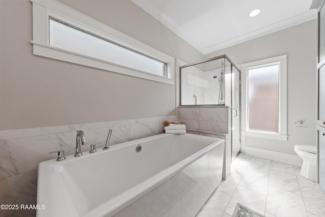 bathroom with independent shower and bath, ornamental molding, and toilet