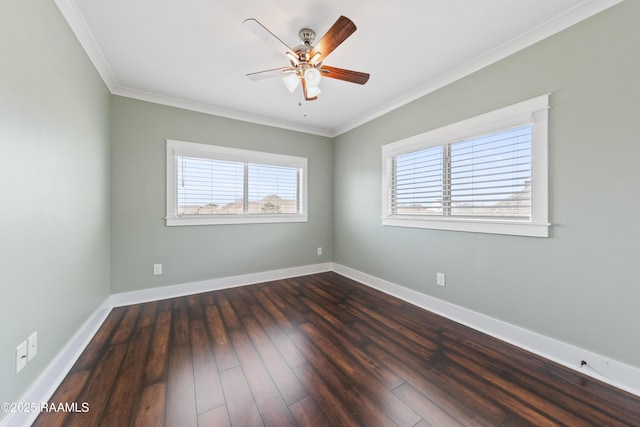 spare room featuring ornamental molding, dark wood-type flooring, and ceiling fan