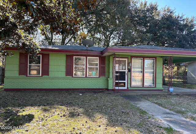 view of front of home featuring a carport