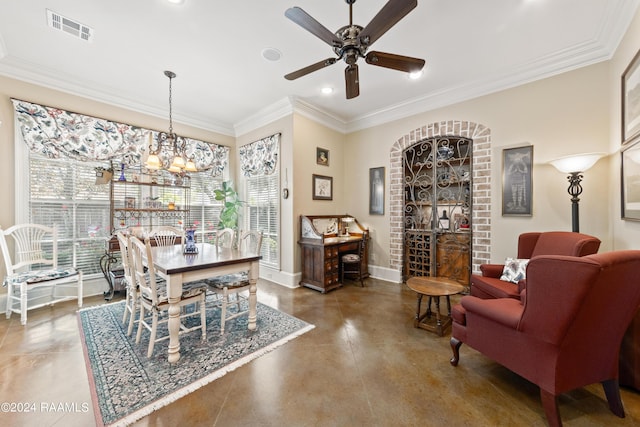 dining room with ornamental molding, ceiling fan with notable chandelier, and concrete floors