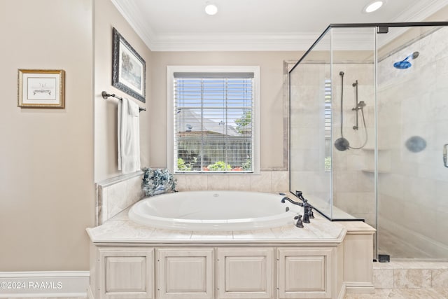 bathroom with crown molding and plus walk in shower