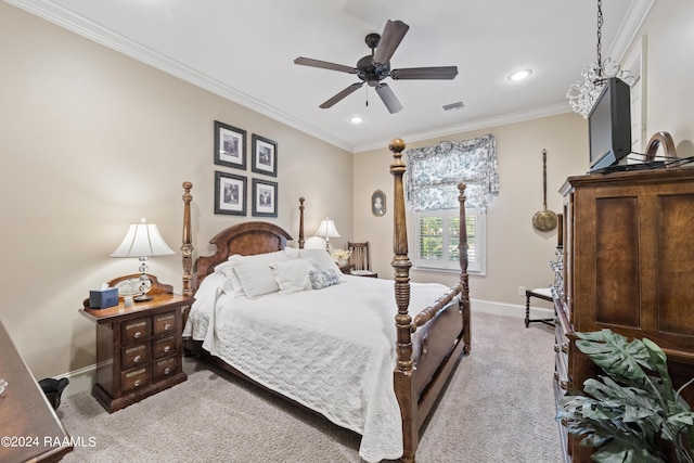 bedroom featuring crown molding, ceiling fan, and light carpet