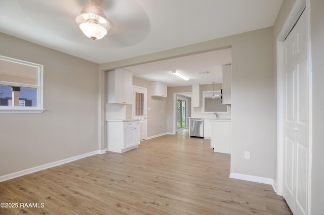 unfurnished living room featuring light hardwood / wood-style flooring