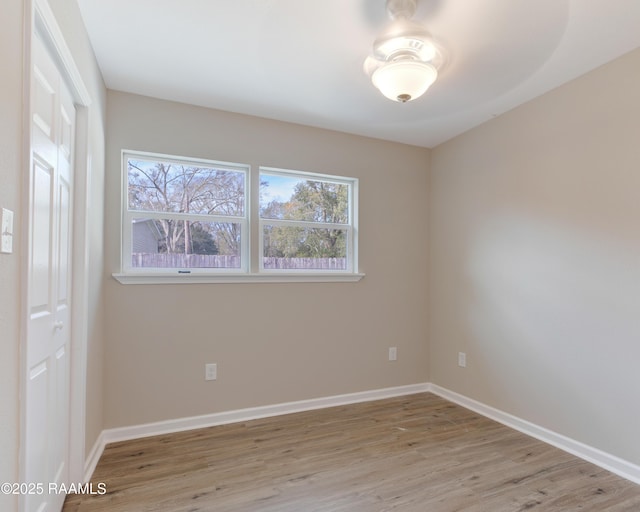 unfurnished room featuring light wood-type flooring