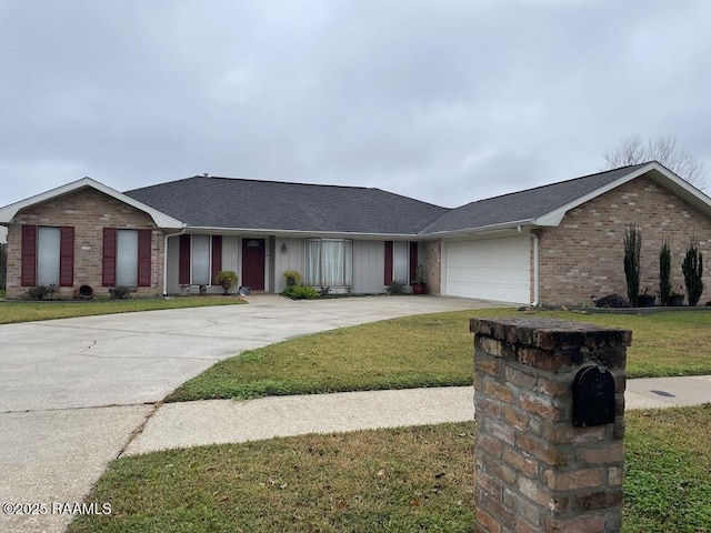 ranch-style home with a garage and a front yard