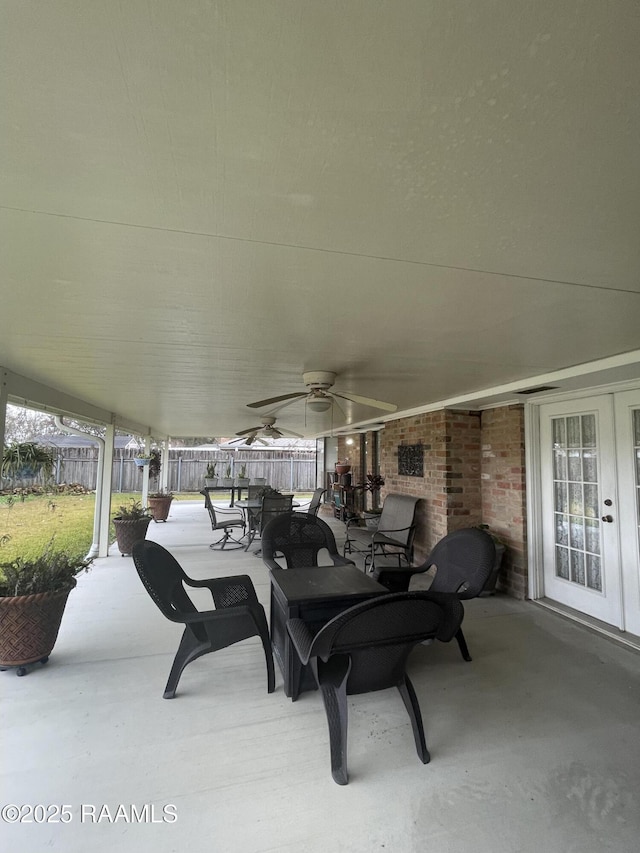 view of patio featuring ceiling fan