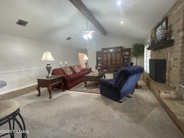 carpeted living room featuring lofted ceiling with beams, ceiling fan, and a fireplace