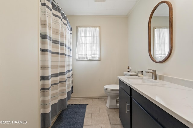 bathroom featuring tile patterned floors, ornamental molding, toilet, and vanity